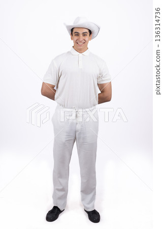 Young man in white chef uniform walking in studio Young man in white chef uniform walking in studio 136314736