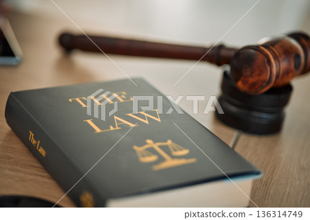 Justice law book and gavel in court for truth, freedom and legal system for rights, faith and constitution. Courtroom, desk and expert guide for judge in knowledge, information and trust with hammer. Justice law book and gavel in court for truth, freedom and legal system for rights, faith and constitution. Courtroom, desk and expert guide for judge in knowledge, information and trust with hammer. 136314749