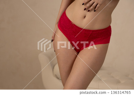 Close up of woman wearing red underwear 136314765