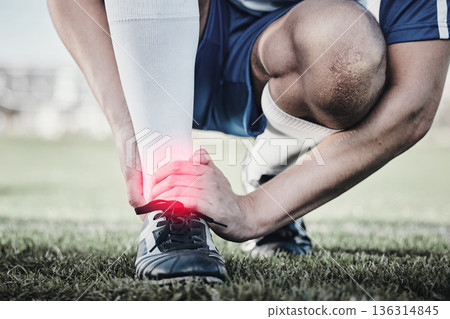 Accident, sports and hand of a man on foot pain, soccer emergency and injury while training. Fitness, problem and an athlete or football player with inflammation or a swollen muscle on the field 136314845