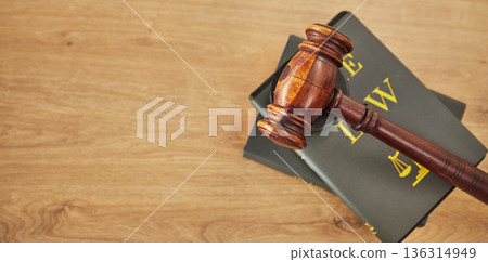 Gavel, law and books on wooden table, space or mockup for judge, justice or lawyer in courtroom. Background, hammer and research knowledge for legal study, constitution and truth, litigation or trial Gavel, law and books on wooden table, space or mockup for judge, justice or lawyer in courtroom. Background, hammer and research knowledge for legal study, constitution and truth, litigation or trial 136314949