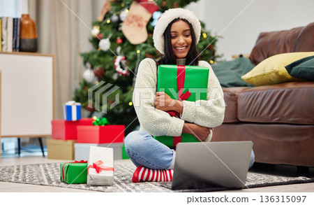 Woman, Christmas present and laptop, video call and celebrate holiday, happiness and communication. Virtual conversation, contact on pc and female person at home with gift giving, package and smile Woman, Christmas present and laptop, video call and celebrate holiday, happiness and communication. Virtual conversation, contact on pc and female person at home with gift giving, package and smile 136315097