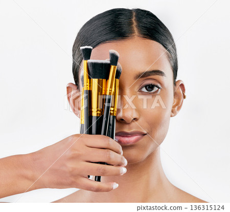 Portrait, skincare and woman with makeup, brushes and organic facial against a white studio background. Face, female person and model with cosmetics tools, natural beauty and luxury with wellness Portrait, skincare and woman with makeup, brushes and organic facial against a white studio background. Face, female person and model with cosmetics tools, natural beauty and luxury with wellness 136315124