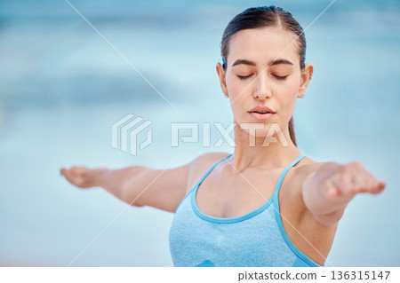 Fitness, yoga and woman for balance by beach for wellness, healthy body and energy. Sports, nature and face of female person with eyes closed to focus for exercise, training and workout by ocean Fitness, yoga and woman for balance by beach for wellness, healthy body and energy. Sports, nature and face of female person with eyes closed to focus for exercise, training and workout by ocean 136315147