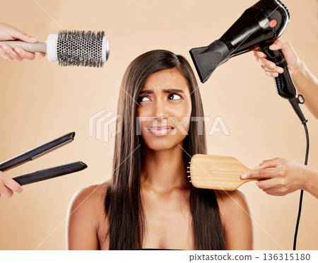 Hair, tools and worry of woman with product for beauty, heat treatment and unhappy on studio background. Indian female model, stress and anxiety for brush, hairdryer and flat iron styling equipment Hair, tools and worry of woman with product for beauty, heat treatment and unhappy on studio background. Indian female model, stress and anxiety for brush, hairdryer and flat iron styling equipment 136315180