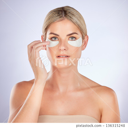 Skincare, portrait and woman with eye patch for facial hydration, beauty care or collagenwhite. glow. Anti aging product, cosmetic repair benefits or person with studio face mask on white background Skincare, portrait and woman with eye patch for facial hydration, beauty care or collagenwhite. glow. Anti aging product, cosmetic repair benefits or person with studio face mask on white background 136315248