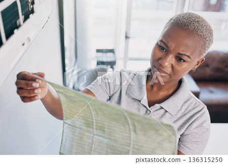 Dirty, cleaning and a black woman with a wall cover for maintenance, building or home renovation. Dust, construction and an African girl or cleaner with a trash, waste or garbage problem in a house Dirty, cleaning and a black woman with a wall cover for maintenance, building or home renovation. Dust, construction and an African girl or cleaner with a trash, waste or garbage problem in a house 136315250