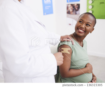 Healthcare, vaccine and pregnant woman with doctor and support, covid safety and consulting. Happy, hospital and an African patient with nurse after vaccination during pregnancy for virus security Healthcare, vaccine and pregnant woman with doctor and support, covid safety and consulting. Happy, hospital and an African patient with nurse after vaccination during pregnancy for virus security 136315305