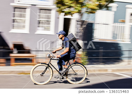 Transportation, delivery on bicycle with parcel and city street for distribution service. Eco friendly transport or logistics, cycling courier and male person with package for shipping in road Transportation, delivery on bicycle with parcel and city street for distribution service. Eco friendly transport or logistics, cycling courier and male person with package for shipping in road 136315463