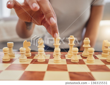 Chess, game and hand of woman with board moving piece for strategy, thinking and challenge. Competition, winning and zoom of hands of person with chessboard in living room for playing to checkmate Chess, game and hand of woman with board moving piece for strategy, thinking and challenge. Competition, winning and zoom of hands of person with chessboard in living room for playing to checkmate 136315531