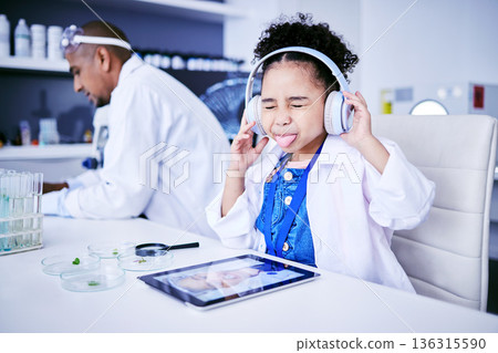Crazy, lab and child with music and tablet for science with a father or scientist for work or learning. Funny, future and a comic girl streaming audio on tech with a person for innovation in medicine Crazy, lab and child with music and tablet for science with a father or scientist for work or learning. Funny, future and a comic girl streaming audio on tech with a person for innovation in medicine 136315590