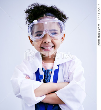 Child, portrait and happy scientist girl in studio with arms crossed, glasses and a smile. Face of a African kid student excited for medical science, education or biology experiment for future career 136315593