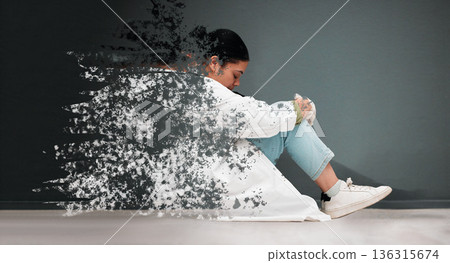 Sad, mental health and woman with depression or thinking of anxiety, problem or frustrated. Fading, depressed and a young person or girl sitting with grief, psychosis or fail on a dark background 136315674