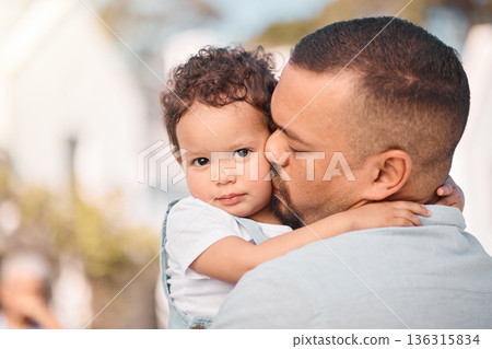 Love, dad and child hug, kiss and family bonding, support and trust in safety of parents embrace. Security, future hope and father with baby outside, hugging and spending safe quality time together. Love, dad and child hug, kiss and family bonding, support and trust in safety of parents embrace. Security, future hope and father with baby outside, hugging and spending safe quality time together. 136315834