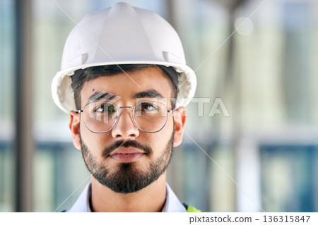 Architecture, serious and portrait of man on construction site for engineering, design and building. Labor, real estate and property with face of contractor for renovation, builder and maintenance 136315847