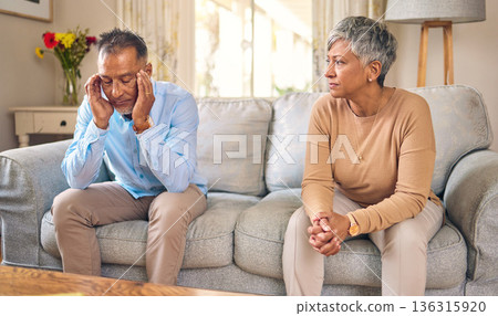 Senior couple, stress and divorce in fight, conflict or argument for disagreement on living room sofa at home. Elderly man and woman in depression, infertility or toxic relationship in the house Senior couple, stress and divorce in fight, conflict or argument for disagreement on living room sofa at home. Elderly man and woman in depression, infertility or toxic relationship in the house 136315920
