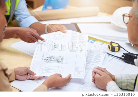 Floor plan, meeting or hands of civil engineering team planning a building or construction architecture. Teamwork, collaboration or group of designers talking or speaking of blueprint ideas 136316010