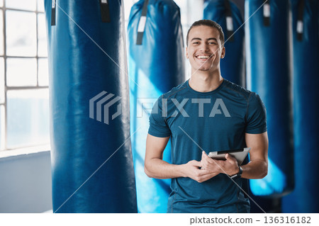 Fitness, man and gym coach with tablet ready for exercise class and training with a smile. Young male person, athlete and wellness center for personal trainer happy from workout with digital app Fitness, man and gym coach with tablet ready for exercise class and training with a smile. Young male person, athlete and wellness center for personal trainer happy from workout with digital app 136316182