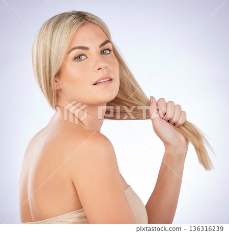 Woman, portrait and strong hairstyle or beauty with shine or luxury salon in white background. Girl, cosmetic and haircare with healthy glow for growth or face with keratin in studio with treatment. 136316239