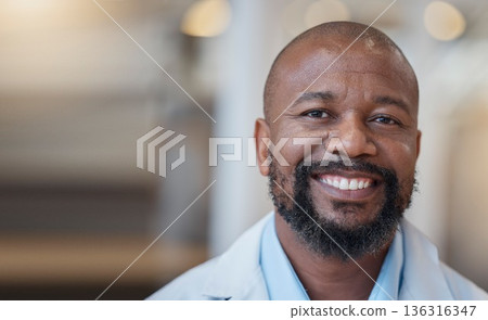 Face, black man and happy doctor in hospital for healthcare, wellness and mockup space. African medical professional, portrait and surgeon, person or employee from Nigeria with smile for health bokeh Face, black man and happy doctor in hospital for healthcare, wellness and mockup space. African medical professional, portrait and surgeon, person or employee from Nigeria with smile for health bokeh 136316347