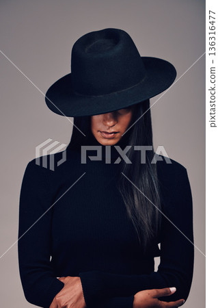 Fashion, woman in hat and beauty, dark and mystery with glamour and luxury isolated on studio background. Designer clothes, black aesthetic and female model, vintage style with cosmetics and edgy Fashion, woman in hat and beauty, dark and mystery with glamour and luxury isolated on studio background. Designer clothes, black aesthetic and female model, vintage style with cosmetics and edgy 136316477