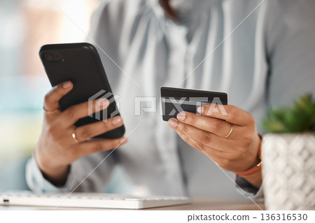 Woman, credit card and hands with phone in office for finance, business accounting and banking password. Closeup of worker, mobile money and internet payment for online shopping, fintech and trading Woman, credit card and hands with phone in office for finance, business accounting and banking password. Closeup of worker, mobile money and internet payment for online shopping, fintech and trading 136316530
