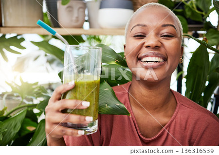 Health, diet and happy with black woman and smoothie for detox, breakfast and protein. Nutrition, food and weight loss with face of person and drink for green juice, vitamins and supplement Health, diet and happy with black woman and smoothie for detox, breakfast and protein. Nutrition, food and weight loss with face of person and drink for green juice, vitamins and supplement 136316539