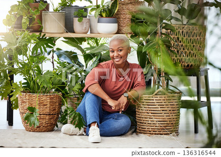 Black woman, plants in a basket and relax with nature, gardening and sustainability with environment. African female person, eco friendly and smile in portrait, happy with botany and green leaves Black woman, plants in a basket and relax with nature, gardening and sustainability with environment. African female person, eco friendly and smile in portrait, happy with botany and green leaves 136316544