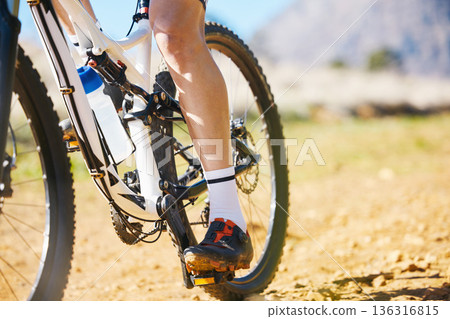 Closeup, outdoor and biker with fitness, cycling and training for a competition, road and sneakers. Zoom, male person or cyclist with workout goal, nature or travel with performance athlete or sports Closeup, outdoor and biker with fitness, cycling and training for a competition, road and sneakers. Zoom, male person or cyclist with workout goal, nature or travel with performance athlete or sports 136316815