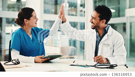 Doctor, nurse and high five in hospital for achievement, report success or residency promotion. Medical people, celebration and excited for bonus meeting, healthcare praise and teamwork results Doctor, nurse and high five in hospital for achievement, report success or residency promotion. Medical people, celebration and excited for bonus meeting, healthcare praise and teamwork results 136316953