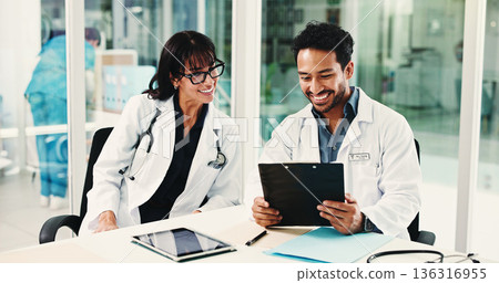Meeting, clipboard and reading with doctors in hospital for team, surgery schedule and healthcare. Patient records, planning and medical with people in clinic for checklist, research and review Meeting, clipboard and reading with doctors in hospital for team, surgery schedule and healthcare. Patient records, planning and medical with people in clinic for checklist, research and review 136316955