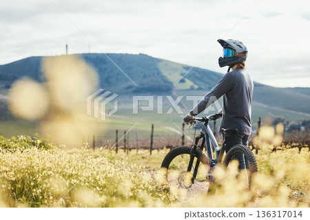 Sports, mockup and man on mountain bike in nature for training, workout and exercise in countryside. Fitness, cycling and male person with bicycle for adventure, freedom and adrenaline on dirt road 136317014