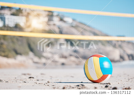 Volleyball, beach sand and net with sports and fitness, outdoor and playing game with nature and summer. Exercise, match with ball closeup and active, workout and tournament with competition 136317112