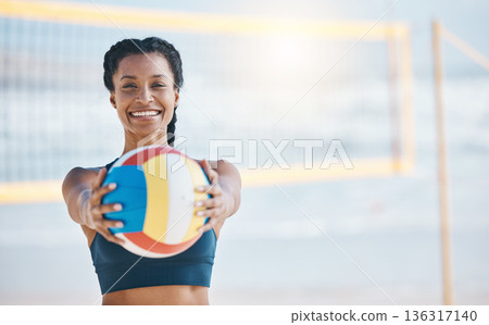 Happy woman, portrait and volleyball by net on beach for sports game, match or fitness outdoors. Fit, active or sporty female person with ball for volley exercise, training or practice by ocean coast 136317140