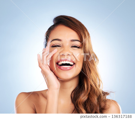 Portrait, woman and skincare with dermatology or natural beauty, anti aging care and wellness from cosmetics on studio background. Laughing, face and hands touching healthy and clean skin texture Portrait, woman and skincare with dermatology or natural beauty, anti aging care and wellness from cosmetics on studio background. Laughing, face and hands touching healthy and clean skin texture 136317188