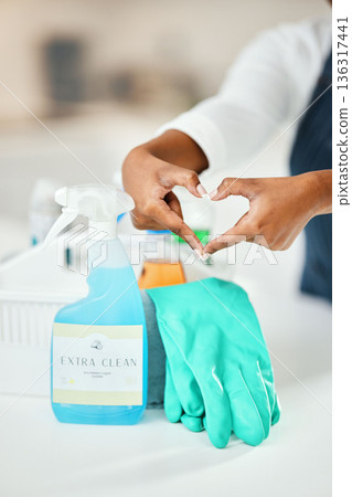 Heart hands, cleaner and chemical detergent bottle, cleaning kitchen and closeup of supplies for hygiene. Care, support and health with disinfectant spray, housekeeping and person with tools to clean Heart hands, cleaner and chemical detergent bottle, cleaning kitchen and closeup of supplies for hygiene. Care, support and health with disinfectant spray, housekeeping and person with tools to clean 136317441