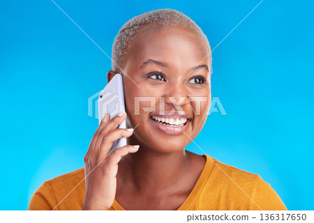 Phone call communication, face and happy black woman speaking in conversation, consulting or chat discussion. Cellphone user, studio smile and talking African person listening on blue background 136317650
