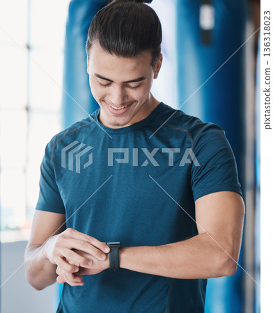 Man, fitness and smart watch with app to check, measure or time exercise for tracking health on technology. Sports, athlete and happy with workout, training and cardio wellness in gym facility 136318023