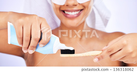 Toothpaste, toothbrush and woman with an oral care routine in a studio for health and wellness. Smile, dental hygiene and closeup of female model getting ready to brush her teeth by white background. 136318062
