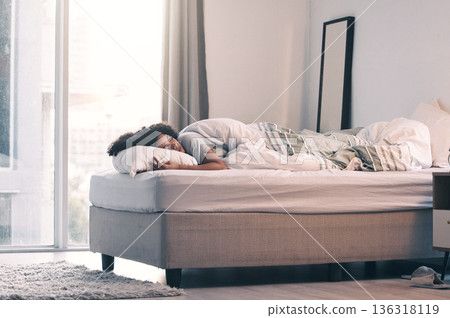 Sleeping, woman and bed with morning nap and home with rest feeling calm with peace. House, bedroom and tired female person relax and comfortable on a pillow with blanket dreaming over the weekend 136318119