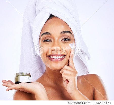 Beauty shine, portrait or happy woman with cream container for skincare, facial hydration or spa product results. Bathroom cosmetics, face moisturizer or morning treatment person on purple background Beauty shine, portrait or happy woman with cream container for skincare, facial hydration or spa product results. Bathroom cosmetics, face moisturizer or morning treatment person on purple background 136318165