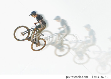 Bicycle, trick or man riding in the air with speed, motion or overlay of cycling, jump or person training to do a crazy stunt. Cyclist, adrenaline and double exposure of parkour, sports or cycling 136318269