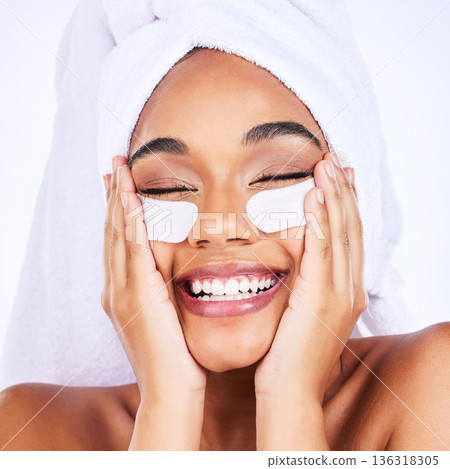 Skincare, face and woman with eye patch in studio for wellness, treatment and anti aging routine on grey background. Fine lines, collagen and female with eyes mask, smile and beauty cosmetic routine Skincare, face and woman with eye patch in studio for wellness, treatment and anti aging routine on grey background. Fine lines, collagen and female with eyes mask, smile and beauty cosmetic routine 136318305