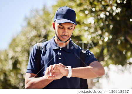 Courier, city and man check watch for package, parcel and customer order delivery in urban town. Ecommerce, logistics and male person with time management for travel, transport and shipping service 136318367