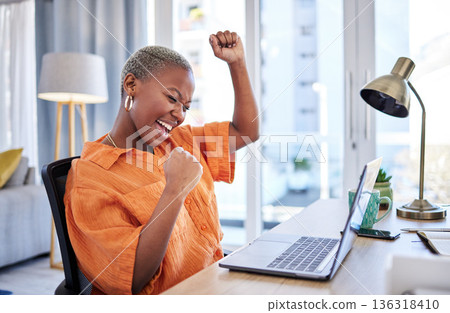 Businesswoman, laptop or winner with fist pump for winning, success or promotion bonus in home office. Happy black woman trader trading or cheering with prize, goal target or good news in remote work 136318410