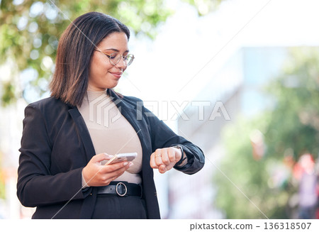 Professional, woman and checking time in outdoor for meeting at office with cellphone for appointment. Schedule, planning and professional female looking at watch in city before interview in street. Professional, woman and checking time in outdoor for meeting at office with cellphone for appointment. Schedule, planning and professional female looking at watch in city before interview in street. 136318507