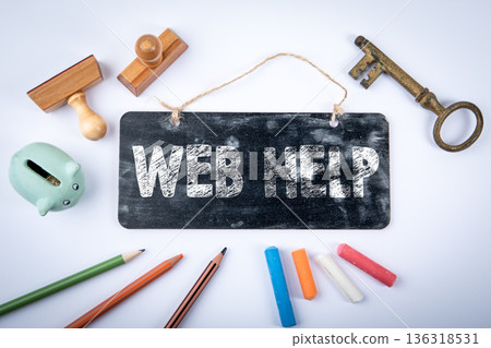 Web Help Concept With Blackboard Sign And Office Supplies On White Background 136318531