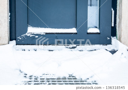 Snow Covered Building Entrance Door Threshold In Winter Conditions Snow Covered Building Entrance Door Threshold In Winter Conditions 136318545