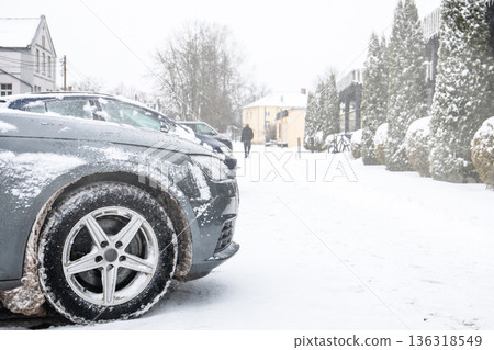 Snow Covered Parked Car On Residential Street During Winter Snow Covered Parked Car On Residential Street During Winter 136318549