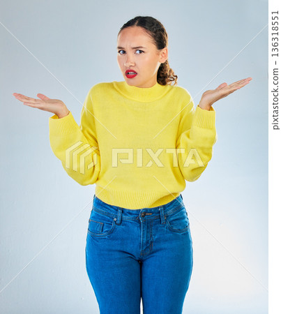 Portrait, shrug and woman confused, question and decisions against a white studio background. Female person, girl and model with confusion, why and i dont know with emoji, puzzle and choice doubt 136318551
